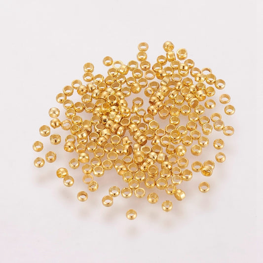 2 gram guldfärgade klämpärlor - 2mm