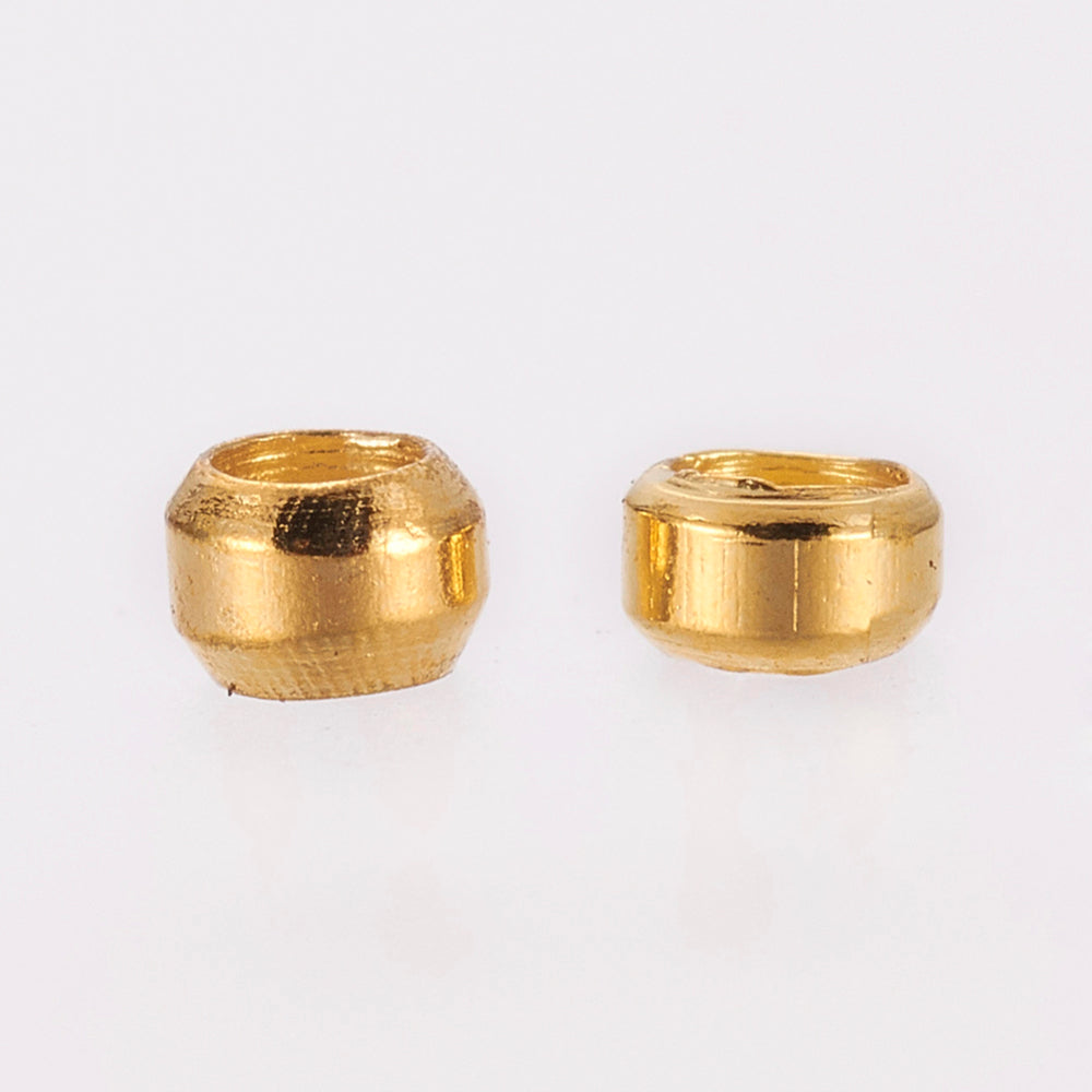2 gram guldfärgade klämpärlor - 2mm