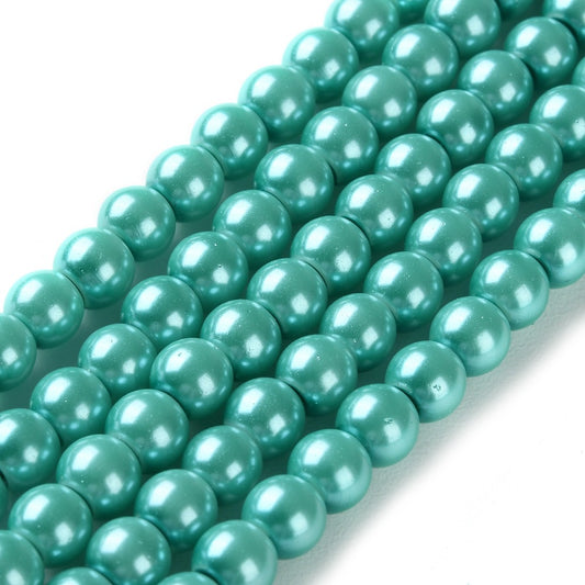 Hel sträng ca 140st Sea green vaxade runda glaspärlor - 6mm