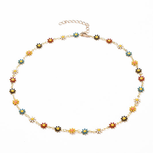 Guldfärgat halsband med söta blommor - 43cm