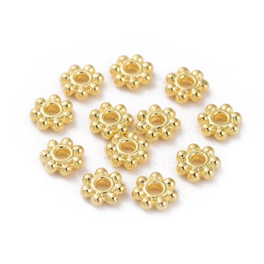 ca 100st guldfärgade daisys mellandelar - 4,5mm