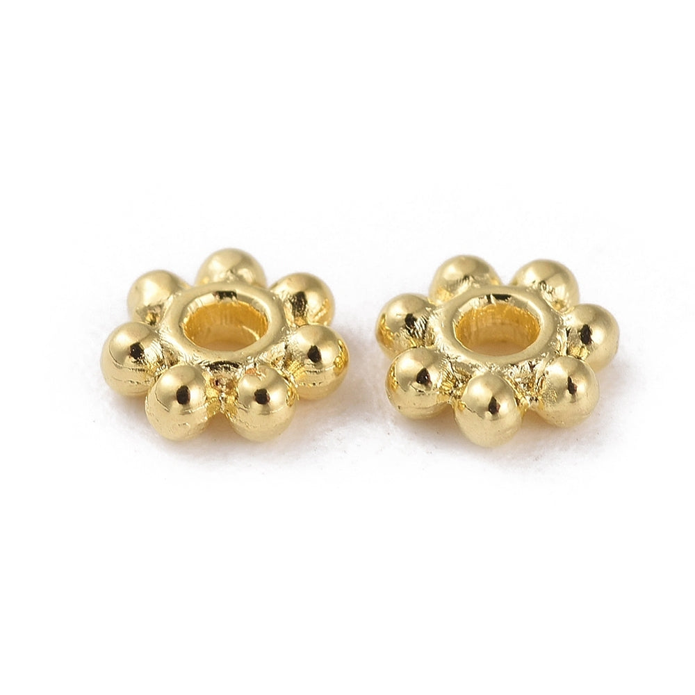 ca 100st guldfärgade daisys mellandelar - 4,5mm