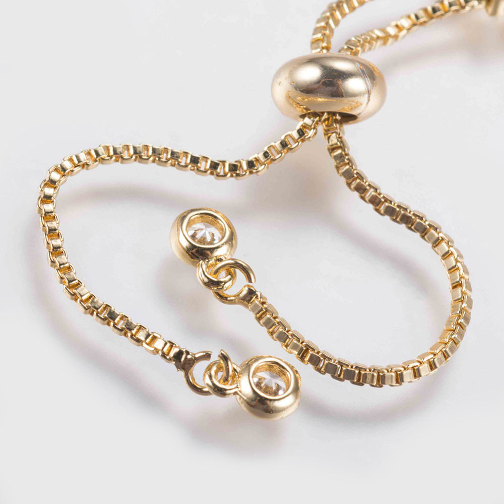 Justerbart slider armband med Cubic Zirconia - guldfärgat